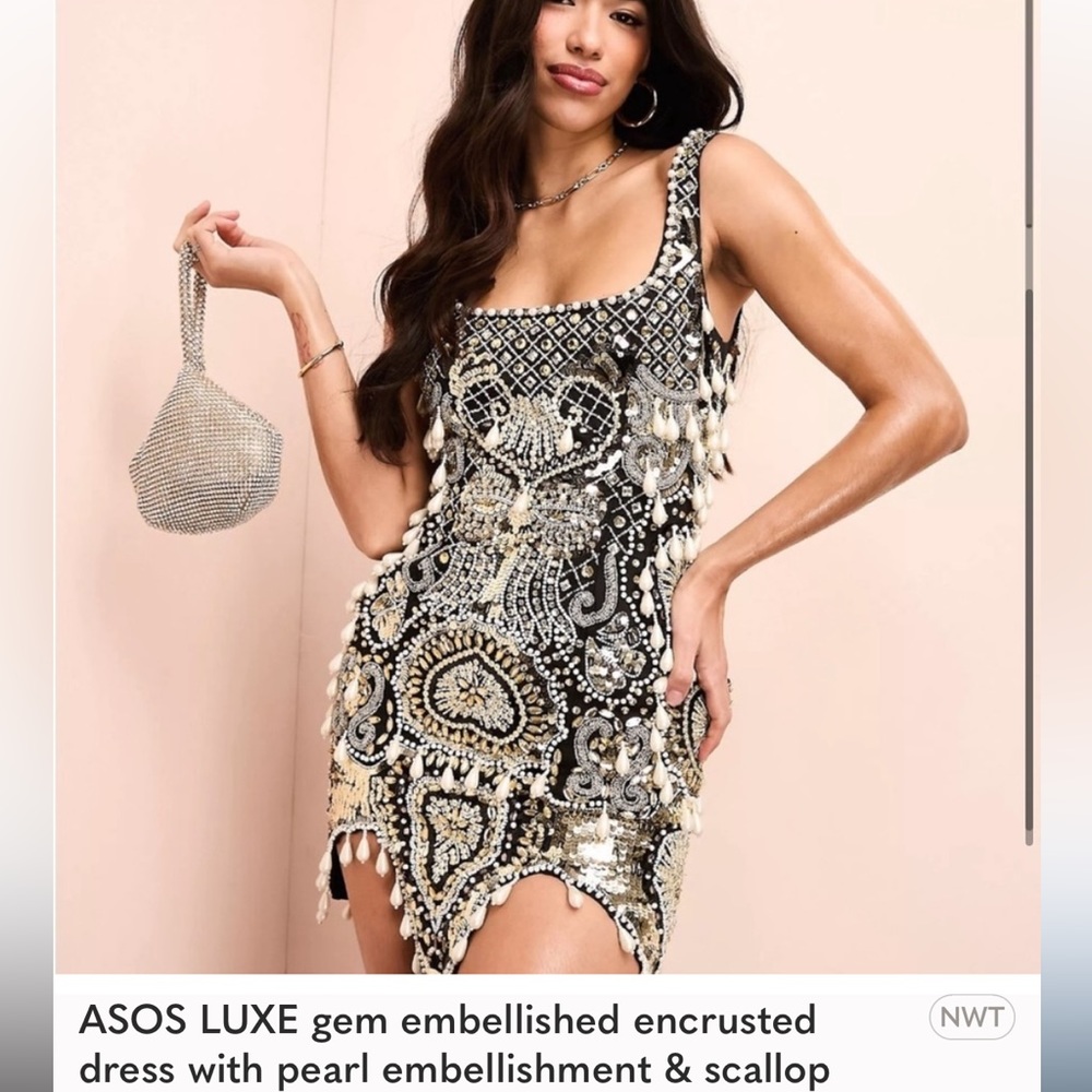 I bought this sold out dress new from ASOS in 0 but would love to trade for a 2.